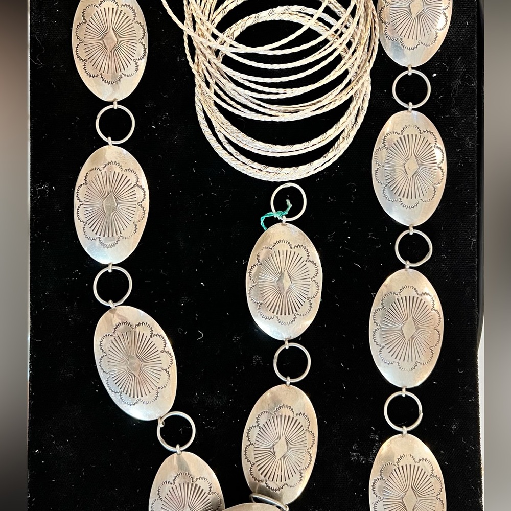Vintage sterling silver (not plated) belt and bracelets. Belt is 39” in length.